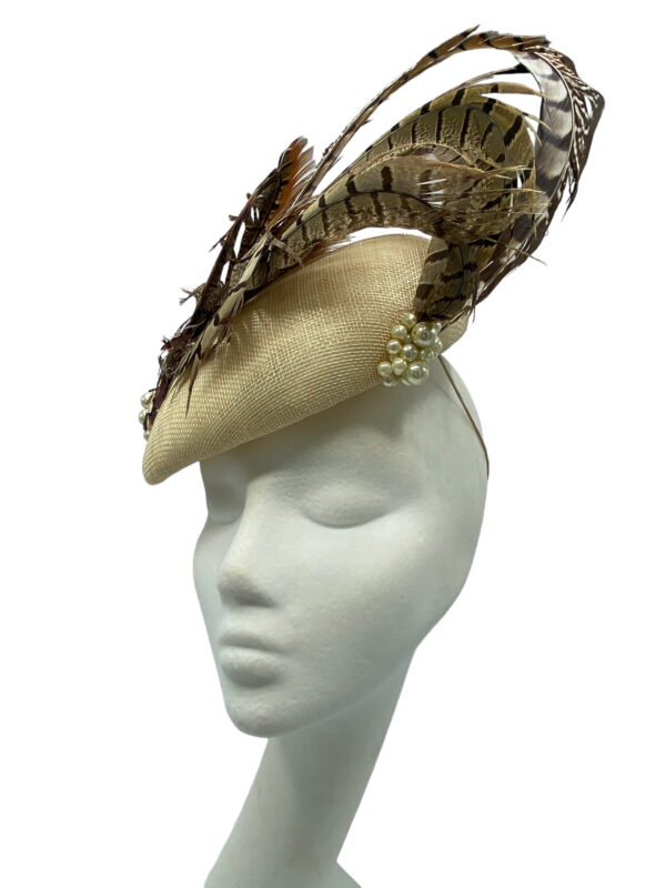 Stunning feather headpiece with pearl bead detail to finish.
